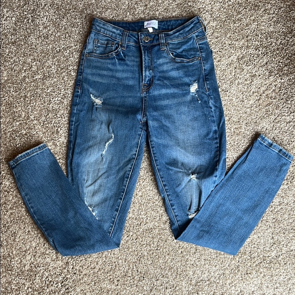 Blue Skinny Jeans with Distressed Details